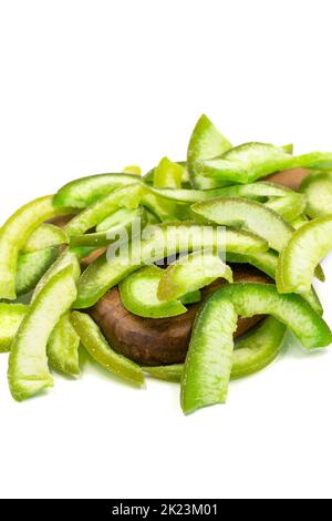 Dried pomelo slice isolated on a white background. Dried fruit in sunlight. close up Stock Photo