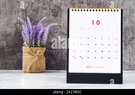 October 2022 Monthly desk calendar for 2022 year with flower. Stock Photo