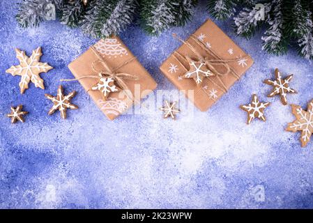 Christmas gift boxes on blue background Stock Photo
