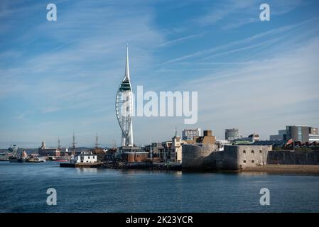 View of the entrance to Portsmouth harbour taken from an outgoing ferry. Clear views of old Portsmouth, round tower and  the Spinnaker tower. Stock Photo