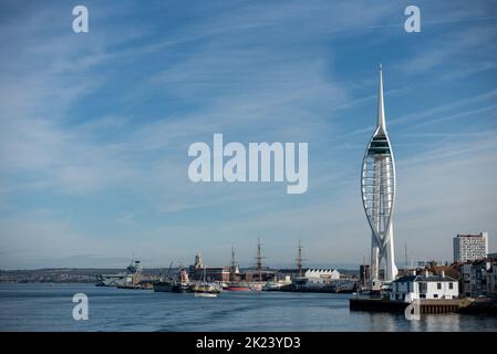 View of the entrance to Portsmouth harbour taken from an outgoing ferry. Clear views of old Portsmouth, the Spinnaker tower and ships in the distance. Stock Photo