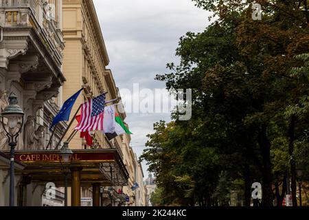 Vienna, Austria - August 13, 2019: Hotel Imperial entrance with flag of European Union and United States of America in Vienna, Austria. Stock Photo