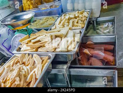 Disgusting unfamiliar Thai food and Chinese cuisine in street food market in China Town Bangkok Thailand. Stock Photo