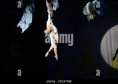 Orenburg, Russia - October 12, 2019: Aerialists perform their number at the circus arena Stock Photo