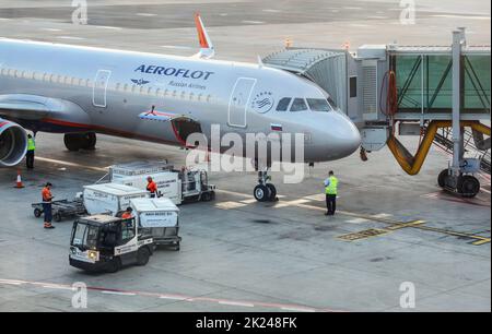 Prague, Czech Republic - July 28th, 2018: Ground personnel loading baggage cargo into Aeroflot Airbus A321 aircraft on Ruzyne, Vaclav Havel Airport. F Stock Photo
