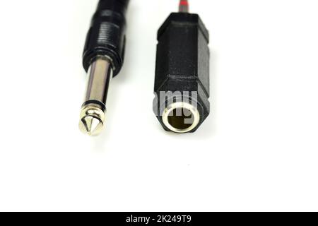 phone jack with coupling for an extension cable in a closeup Stock Photo