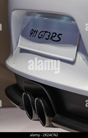 A close-up picture of the rear view of the Porsche 911 GT3 RS, captured in an auto shop in Berlin. Stock Photo