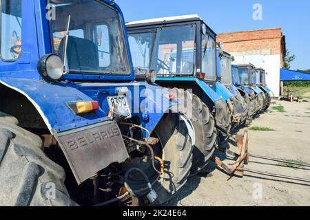 Russia, Temryuk - 15 July 2015: Tractor. Agricultural machinery tractor. Parking of tractor agricultural machinery. The picture was taken at a parking Stock Photo