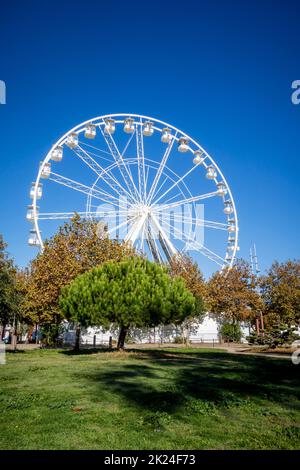 Ferris wheel in La Rochelle old harbor, France Stock Photo