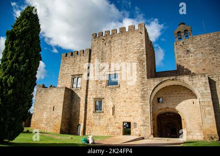 the Castelo and Monastery Santa Maria de Flor da Rosa in the old Town of Flor da Rosa in Alentejo in  Portugal.  Portugal, Estremoz, October, 2021 Stock Photo