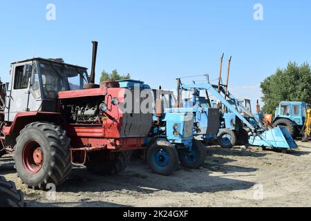 Russia, Temryuk - 15 July 2015: Big tractor. Old Soviet agricultural machinery Stock Photo