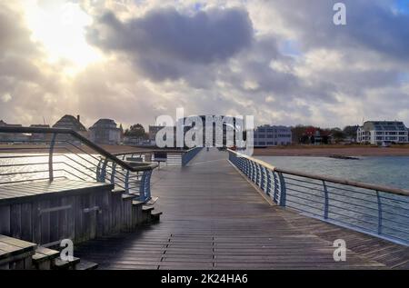 Niendorf, Germany - 30.January 2022: View of the stormy Baltic Sea at a pier in Niendorf on Timmendorfer Strand Stock Photo