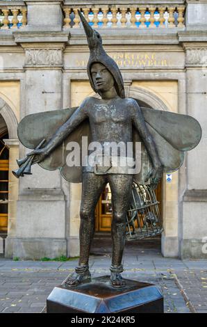 BRUGES, BELGIUM - AUGUST 18, 2013: Statue of Papageno by Jef Claerhout in front of the City Theatre in Bruges, Belgium. Papageno is a character in The Stock Photo