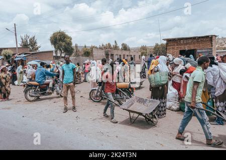 Aje, Oromia Region, Ethiopia - May 16, 2019: Ordinary people and their everyday life on street of city Aje, Oromia Region, Ethiopia, Africa Stock Photo