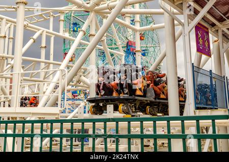 Steeplechase Coaster closed, empty at Luna Park Amusement Park, view of the train in the station, Coney island, Brooklyn, New York City during winter Stock Photo