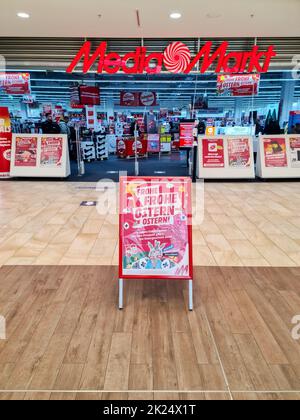 Neumuenster, Germany - 16. April 2022: Entrance area of a Mediamarkt electronics store in a German city center Stock Photo