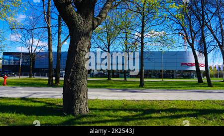 Wroclaw, Poland - April 18, 2022: Porsche AG, headquartered in Stuttgart, is a German automobile manufacturer specializing in high performance sports Stock Photo