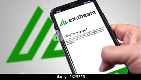 San Francisco, USA, June 2022: hand holding a phone with Exabeam mobile application on screen. Exabeam is a leading provider of the software for analy Stock Photo