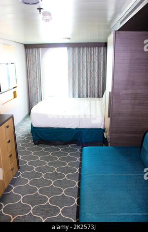Miami, USA - April 29, 2022: The interior of cabin at cruise ship Oasis of the Seas owned Royal Caribbean International. The interier of ship indoor Stock Photo
