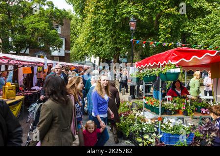 Stalls selling local produce and bric-a-brac at the 'Fair in the Square', an annual festival in Pond Square and South Grove, Highgate Village, London Stock Photo