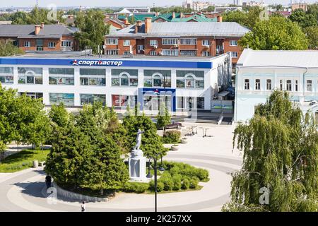 Kolomna, Russia - June 10, 2022: above view of Square of Two Revolutions with monument to Lenin in Old Kolomna city on summer day from bell tower Chur Stock Photo