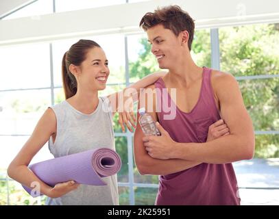 What a workout. a young couple standing face-to-face in sportswear. Stock Photo