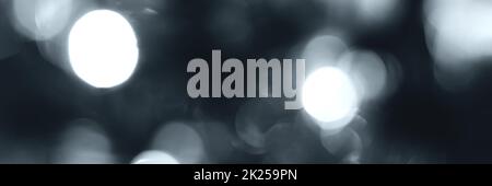 Blurred lights, gray, deep blue background, banner texture. Abstract bokeh with soft light header. Wide screen wallpaper. Panoramic web banner with co Stock Photo