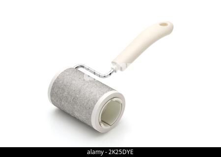 close up of used sticky roller cleaning, housework and housekeeping concept Stock Photo