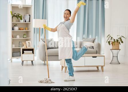 Premium Photo  Woman cleaning the floor with a mop in the living room in  home with a smile happy asian cleaner doing housework or job in a clean  lounge hotel room