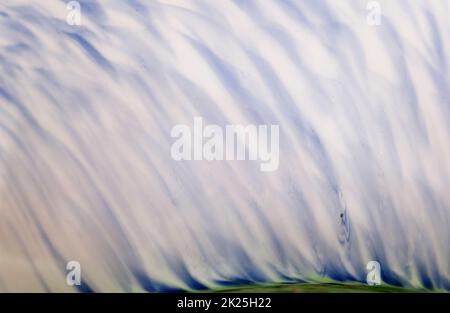 Closeup of Antique Blue, White and Purple Swirl Glass Bowl Stock Photo