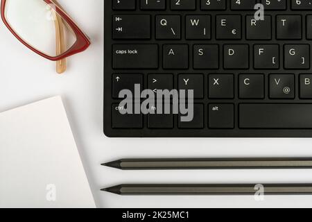 Computer Keyboard And Symbol.Information Medium For Communication.Laptop Keyboard For Typing New Ideas And Planning Development.Technological Equipment Accessing Internet Stock Photo