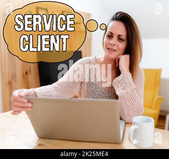 Hand writing sign Service Client. Business idea Dealing with customers satisfaction and needs efficiently Browsing And Chatting In Social Media, Searching And Watching Videos Stock Photo