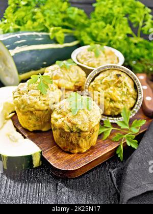 Cupcake with cheese and zucchini on wooden board Stock Photo