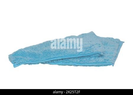 Household cleanliness and hygiene. Close-up of a blue cleaning cloth isolated on a white background. Microfiber cleaning cloth. Macro. Stock Photo