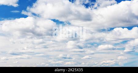Blue sky with soft white clouds in sunny day Stock Photo