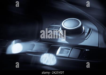 Central console with buttons on car panel Stock Photo