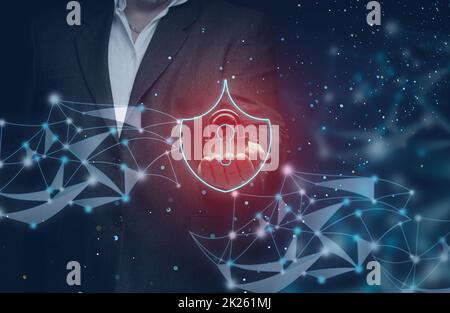businessman in a suit holds a metal padlock on an abstract background of lines and dots. The concept of protecting personal data on the network, cyber security. Reliable data encryption Stock Photo