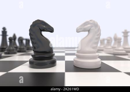 Two chess pieces on a chessboard Stock Photo