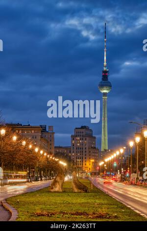 The famous TV Tower of Berlin with the Karl-Marx-Allee at night Stock Photo