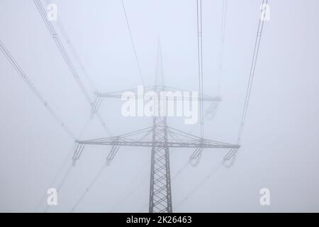 High voltage in the fog Stock Photo