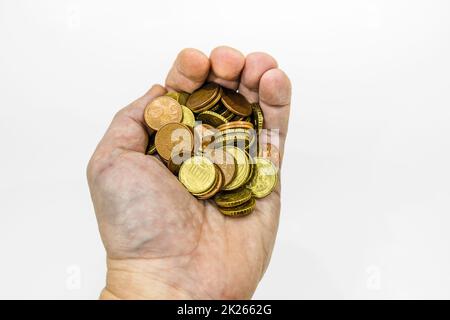 hand holding euro coins on white background Stock Photo