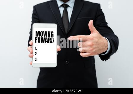 Conceptual caption Moving Foward. Business overview Towards a Point Move on Going Ahead Further Advance Progress Presenting New Technology Ideas Discussing Technological Improvement Stock Photo