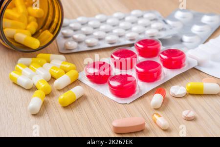 Different medicine pills and capsules in blister packs Stock Photo