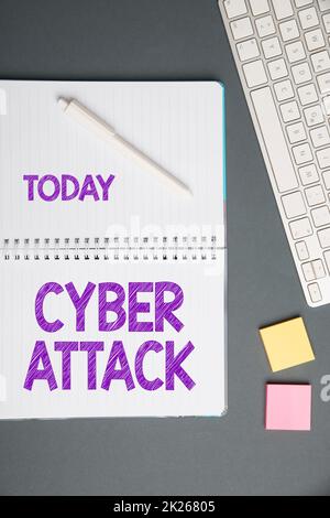 Text caption presenting Cyber Attack. Word Written on An attempt by hackers to Damage Destroy a Computer System Keyboard Over A Table Beside A Notebook And Pens With Sticky Notes Stock Photo