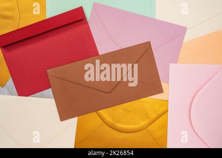 Heap of colorful envelopes on the desk Stock Photo