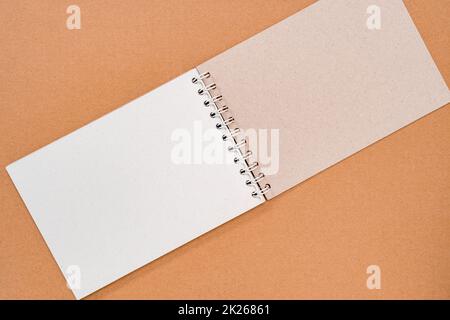 open spiral notebook with blank pages and pen isolated on white background  Stock Photo - Alamy