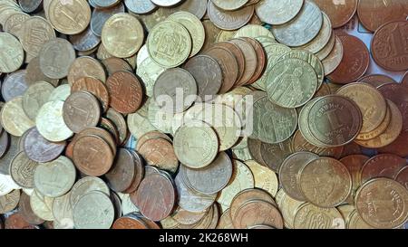 Background of the coins of Ukraine. Ukrainian one-year coins out of circulation. Stock Photo