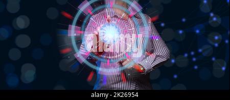 a woman stands in front of a holographic screen and touches the middle with her hand. Business start, progress Stock Photo