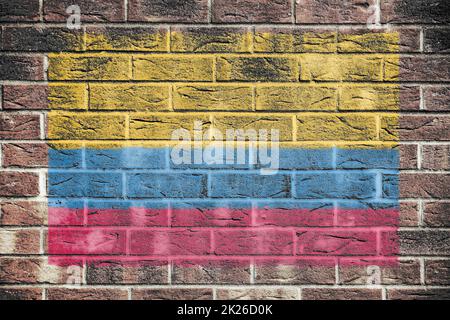 Colombia flag on an old brick wall background Stock Photo