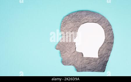 Silhouette of a head, the child inside of an adult, growing up, mindful, schizophrenia, psychology concept Stock Photo